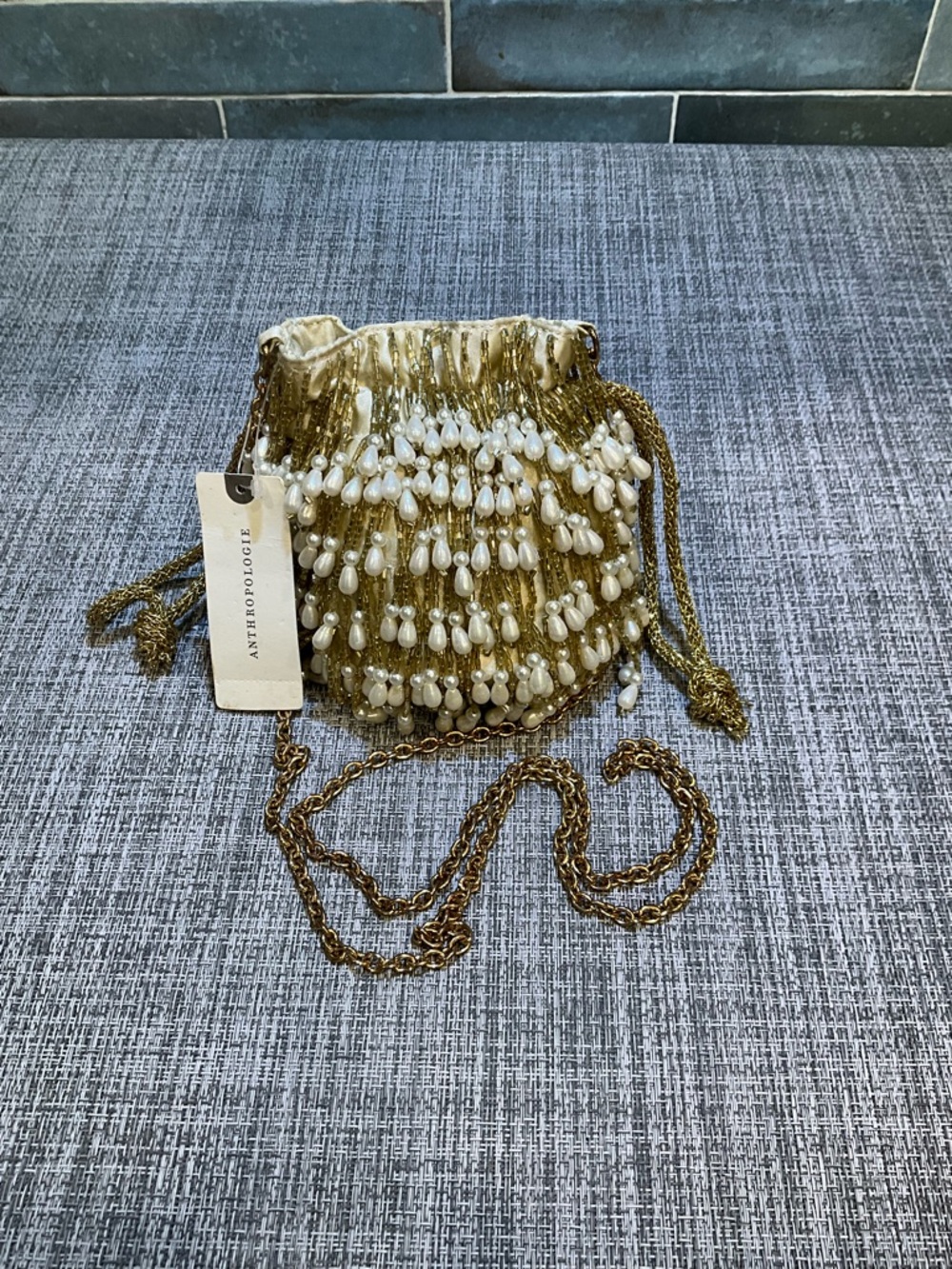 Anthropologie Gold Beaded Drawstring Crossbody Bag